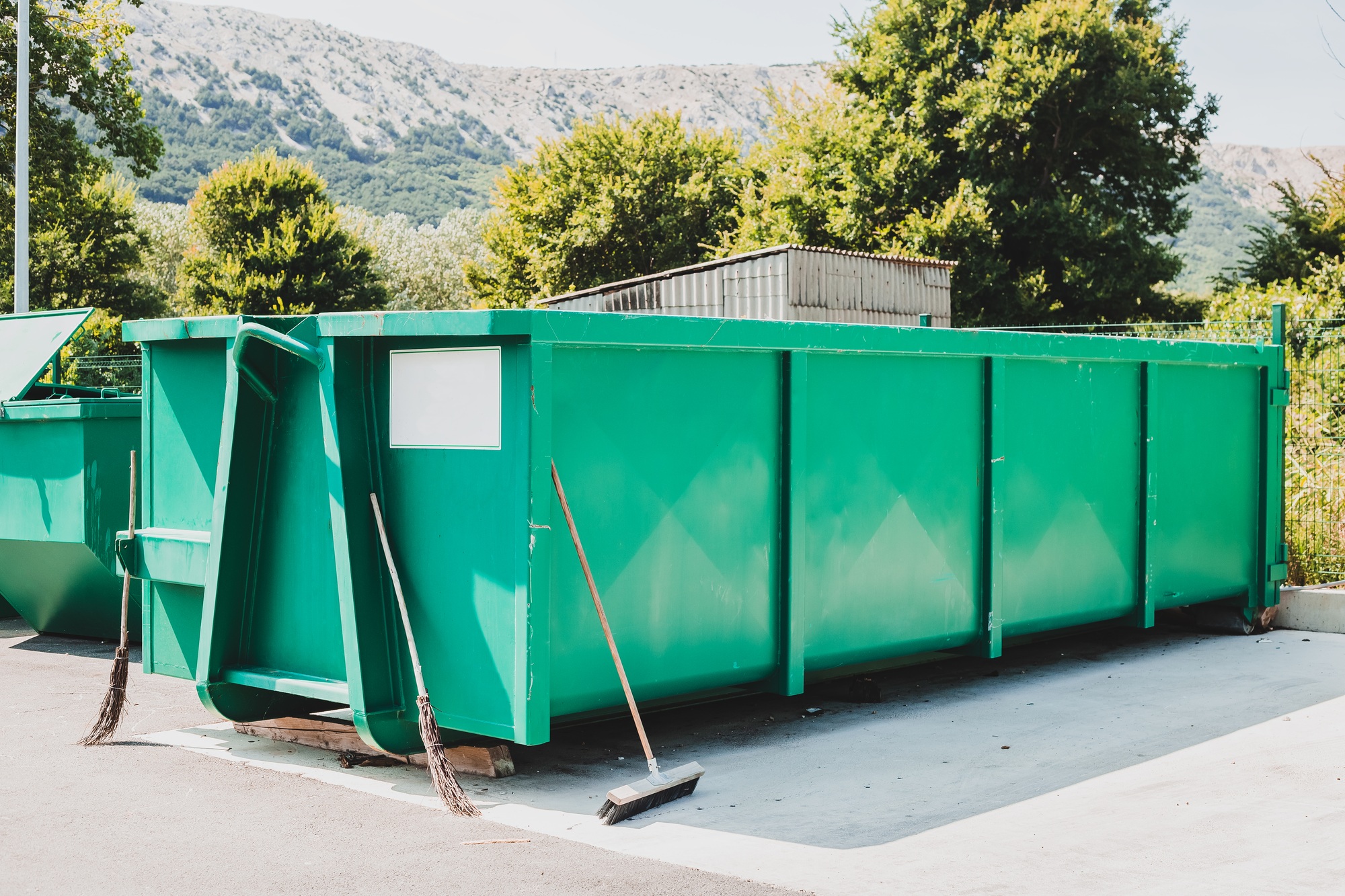 Large waste container at local sorting station