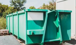 Large waste container at local sorting station Large waste container at local sorting station